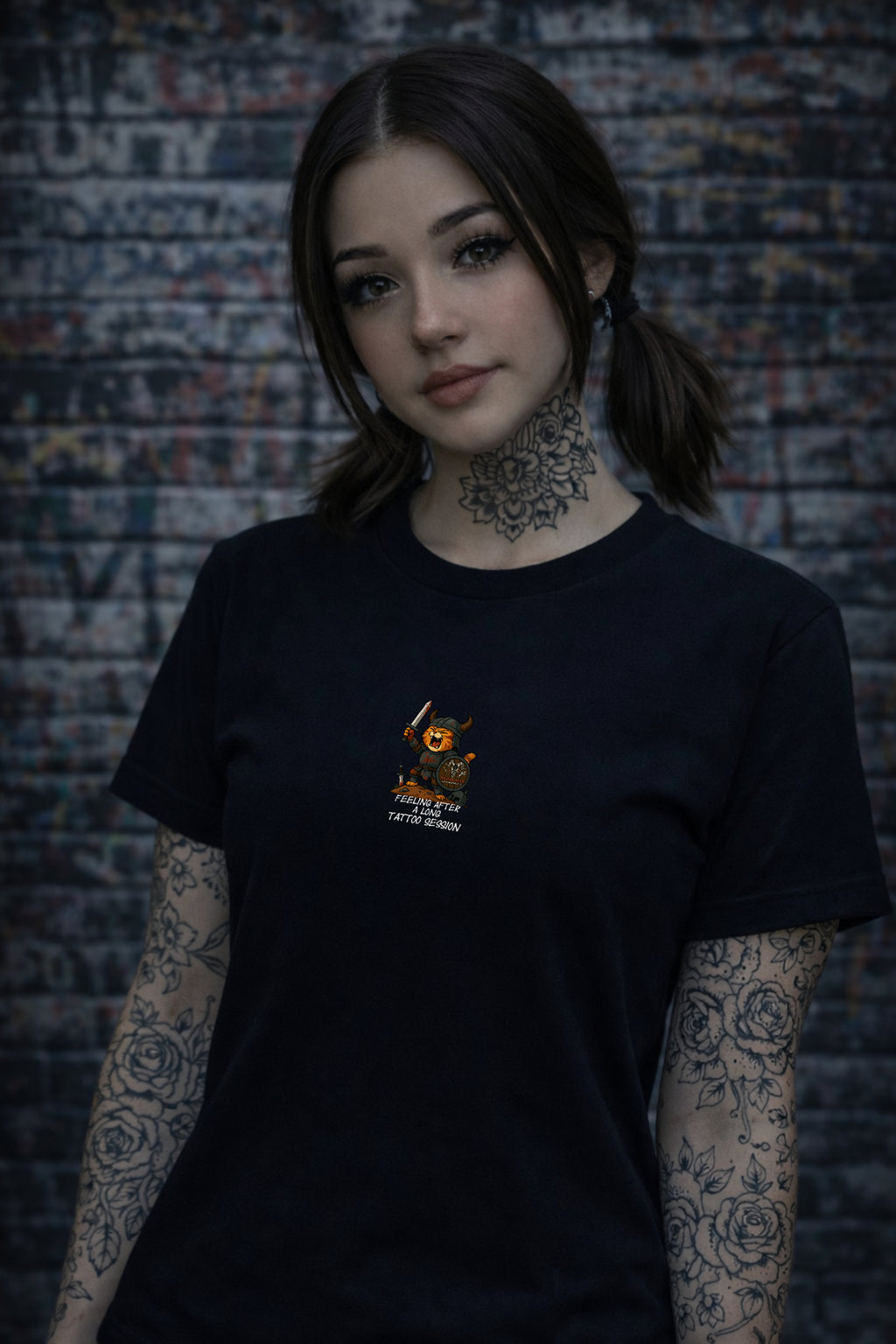 tatted woman wearing black tattoo culture t-shirt with viking berserker cat design