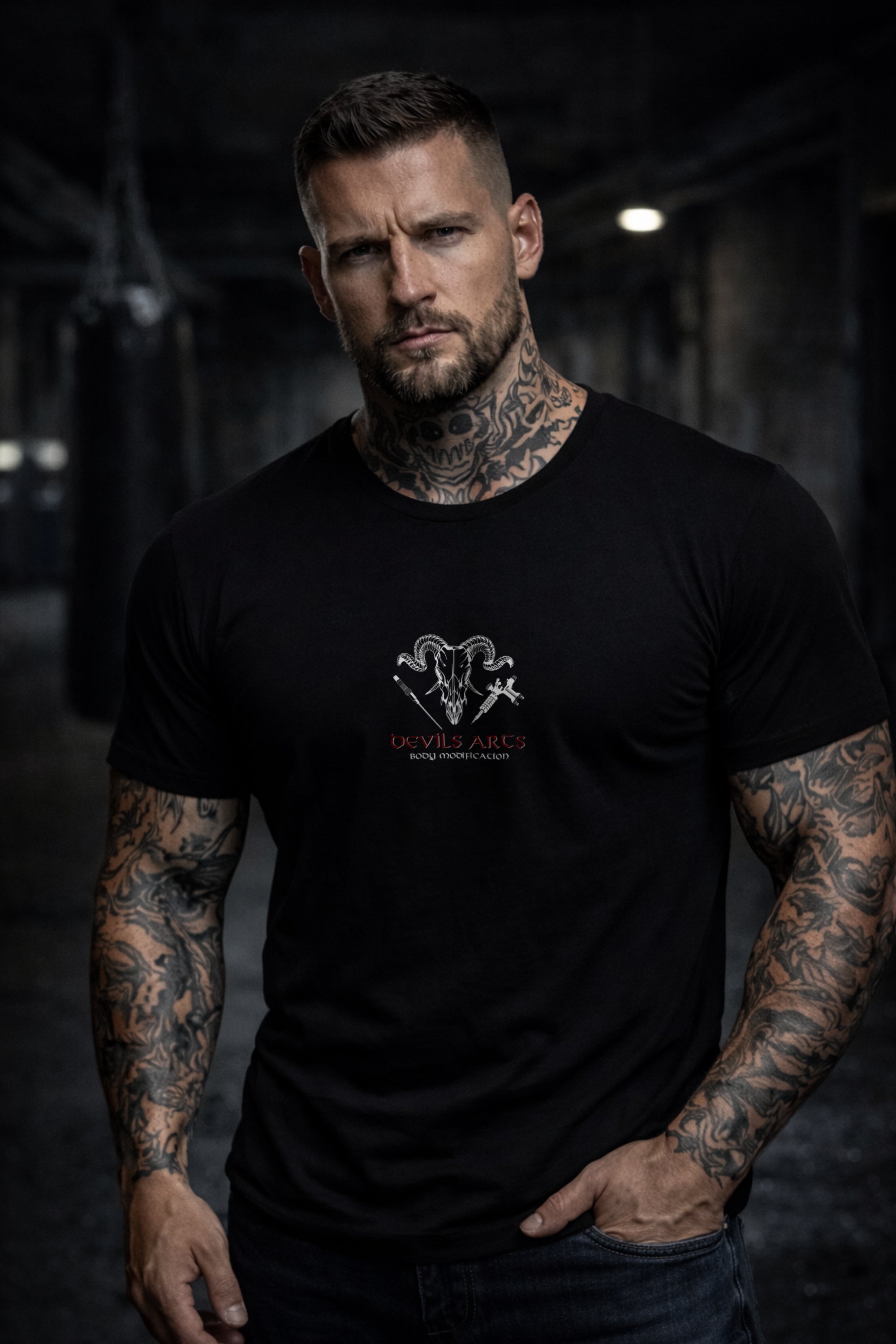 tattooed male model wearing black DEVILS-ARTS skull logo t-shirt tattoo streetwear