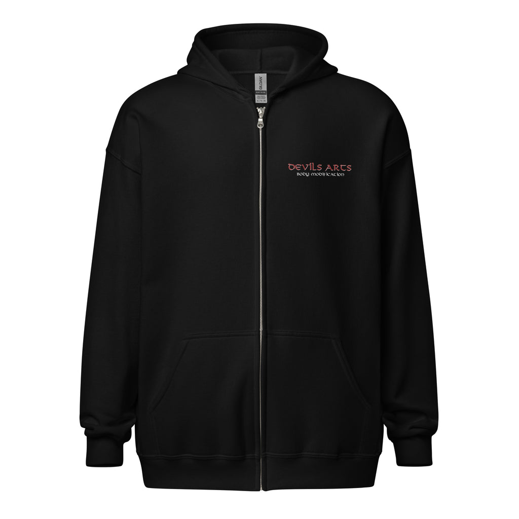 black zip hoodie with small DEVILS-ARTS tattoo logo on chest minimalist tattoo streetwear